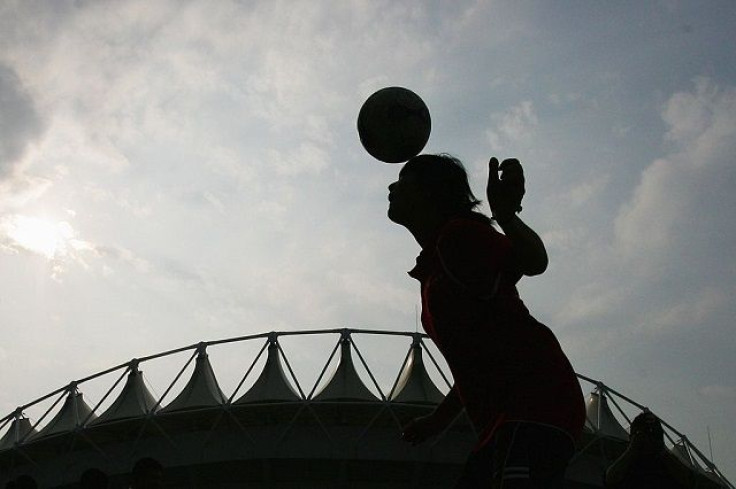 Girl playing soccer