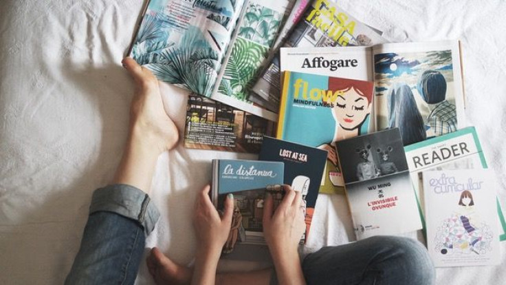 Books and magazines on bed