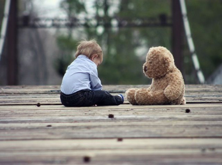 Baby with bear