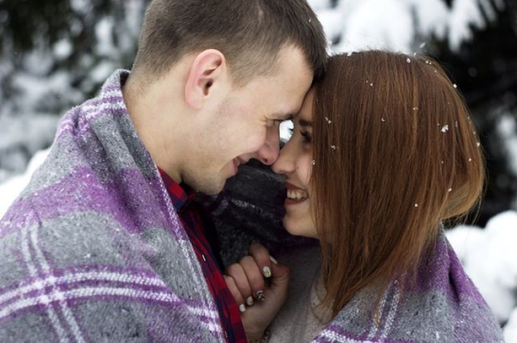 Couple smiling at each other