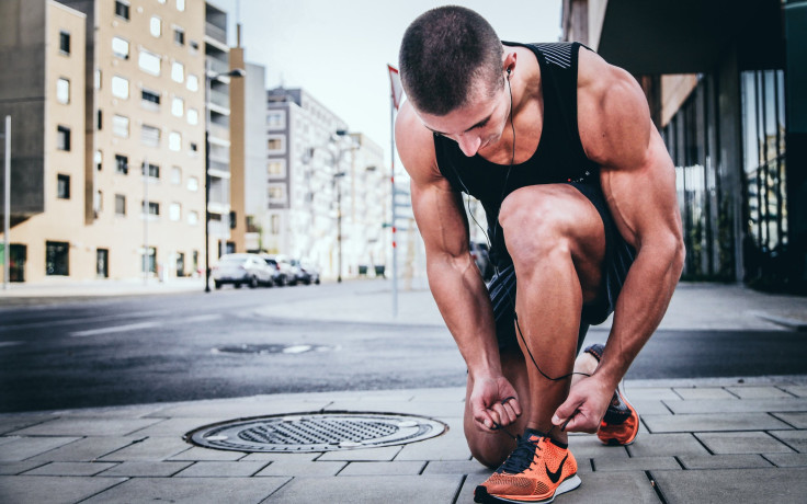 Man tying sneakers