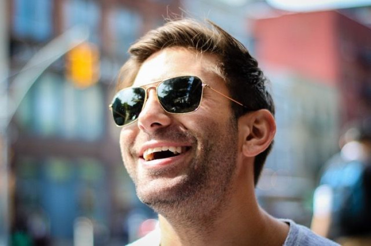 Man with sunglasses smiling