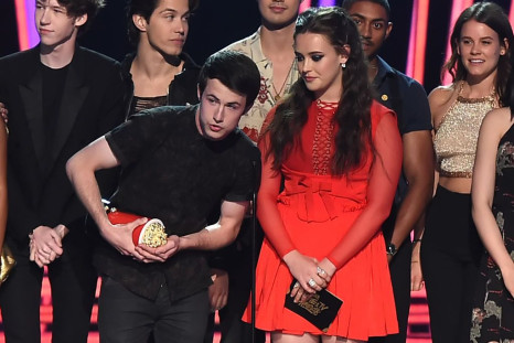 Actors Dylan Minnette (L) and Katherine Langford with the cast of '13 Reasons Why' speak onstage during the 2017 MTV Movie And TV Awards at The Shrine Auditorium on May 7, 2017 in Los Angeles, California.