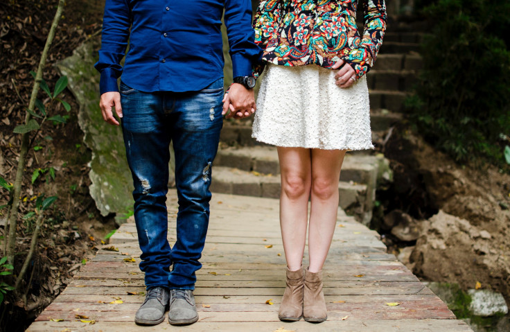 Couple holding hands