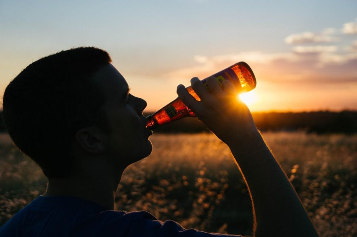 young man drinking beer