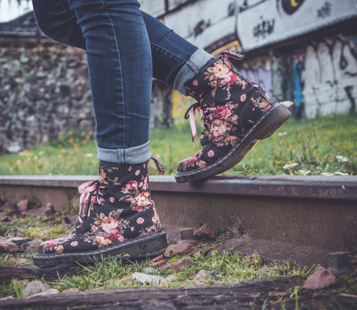 Woman walking with flower boots