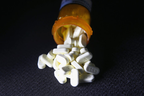 Oxycodone pain pills prescribed for a patient with chronic pain lie on display on March 23, 2016 in Norwich, CT. Communities nationwide are struggling with the unprecidented opioid pain pill and heroin addiction epidemic. On March 15, the U.S. Centers for Disease Control (CDC), announced guidelines for doctors to reduce the amount of opioid painkillers prescribed, in an effort to curb the epidemic. The CDC estimates that most new heroin addicts first became hooked on prescription pain medication before graduating to heroin, which is stronger and cheaper.