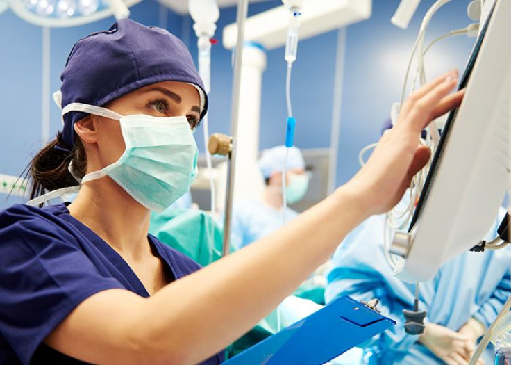 Nurse using monitor