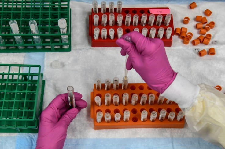a-lab-technician-sorts-blood-samples-for-a