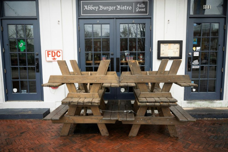 picnic-tables-block-the-closed-doors-of-abbey