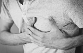 A person experiencing chest pain.
