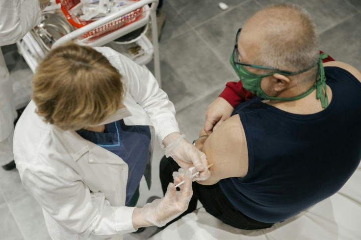 Person receiving vaccine