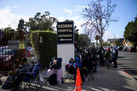 Crowds like this one, seen waiting outside of a hospital in hope of getting doses of vaccine that would otherwise be discarded, show the extreme demand for Covid-19 vaccines.