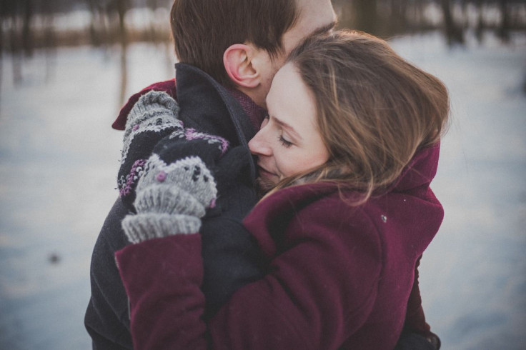 hugs hugging couple