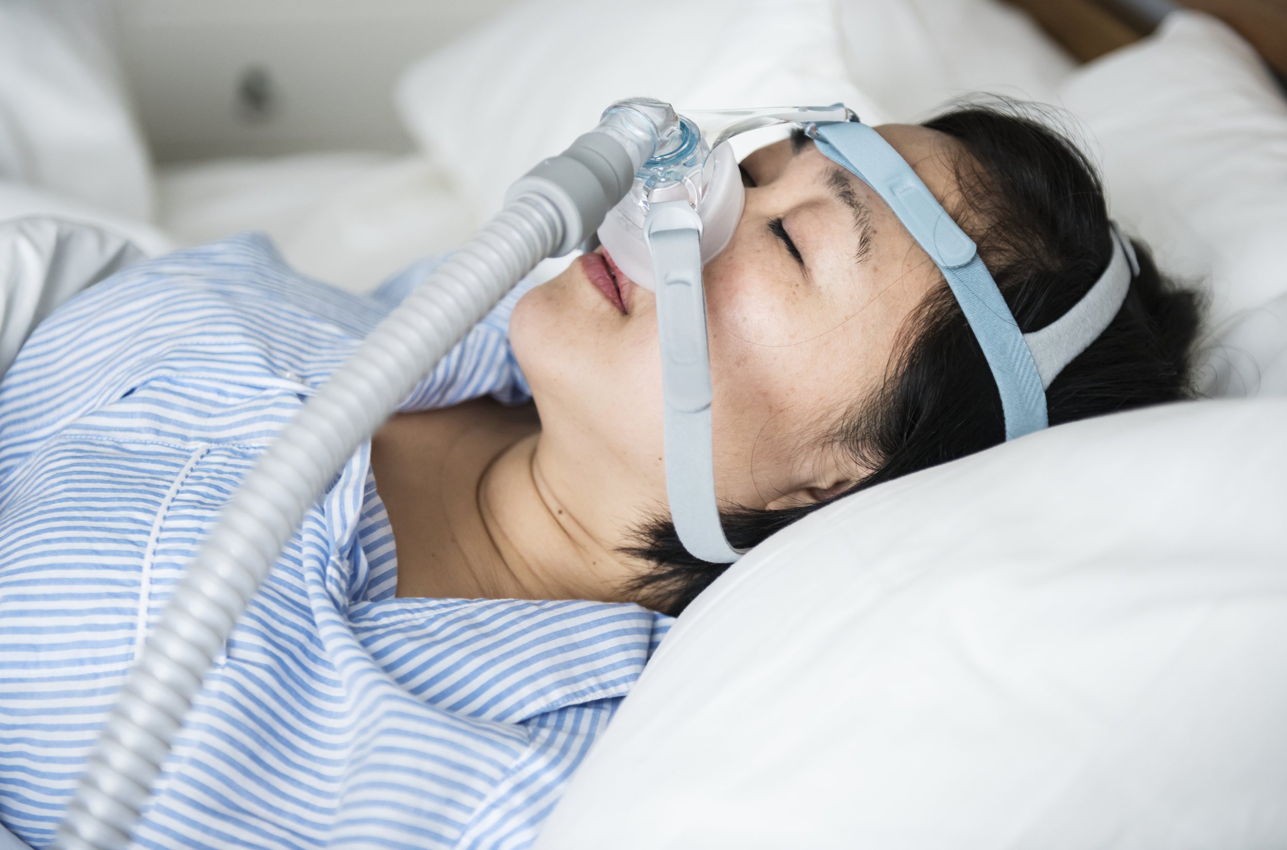 Woman in CPAP machine