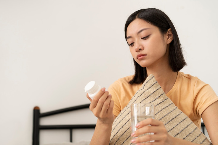 Girl sad with supplements