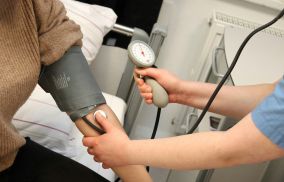 A Person with Blood Pressure Device