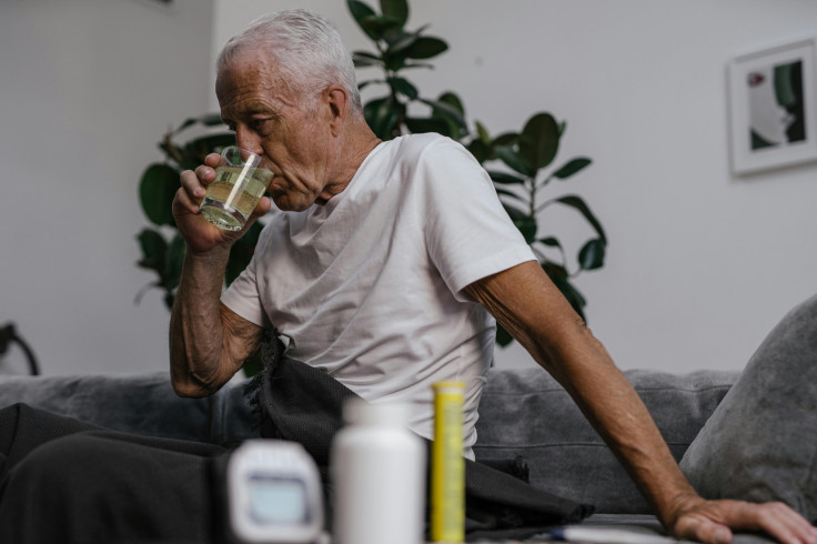Elderly Man Drinking