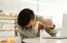 Man covering his mouth