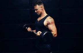 Person Holding Dumbbell