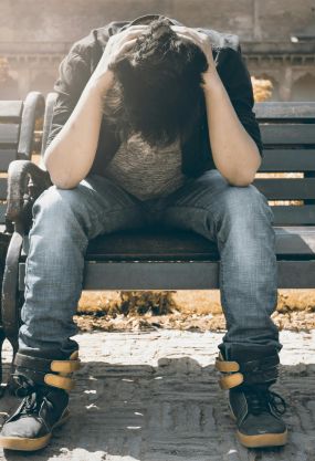 Person Sitting on Bench