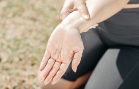 Person Stretching Wrist