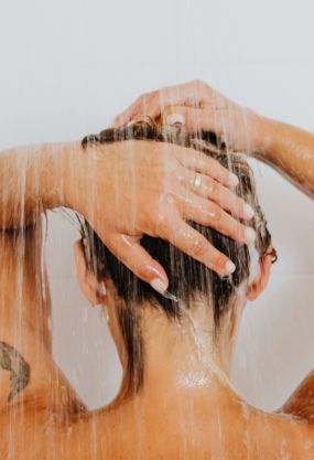Back View of Woman in Shower